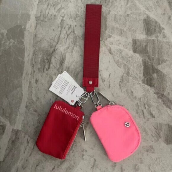 Brand new with tags Lululemon dual pouch keychain - Picture 1 of 1
